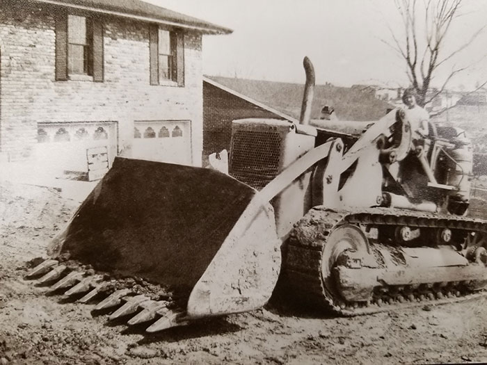 Jimmy Howell operating a tractor.